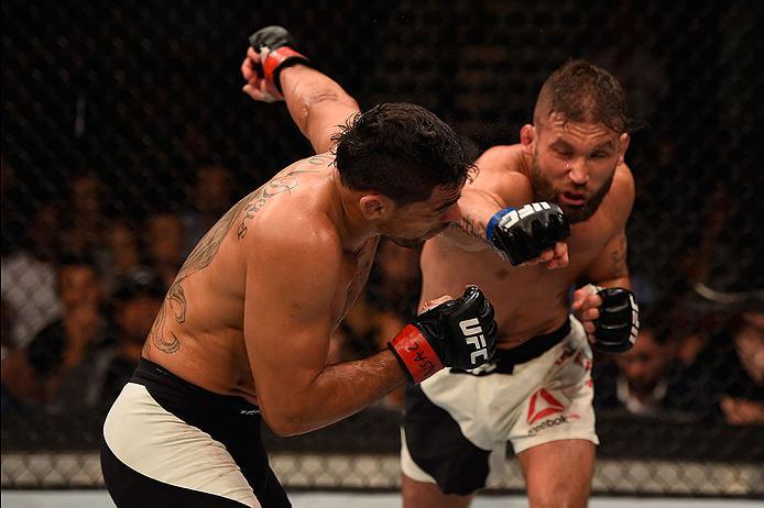 LAS VEGAS, NV - MAY 29: (R-L) Jeremy Stephens punches Renan Barao of Brazil in their featherweight bout during the UFC Fight Night event inside the Mandalay Bay Events Center on May 29, 2016 in Las Vegas, Nevada. (Photo by Josh Hedges/Zuffa LLC/Zuffa LLC