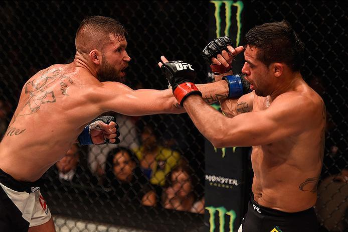 LAS VEGAS, NV - MAY 29: (L-R) Jeremy Stephens punches Renan Barao of Brazil in their featherweight bout during the UFC Fight Night event inside the Mandalay Bay Events Center on May 29, 2016 in Las Vegas, Nevada. (Photo by Josh Hedges/Zuffa LLC/Zuffa LLC