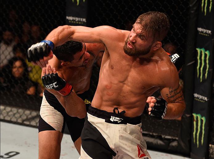 LAS VEGAS, NV - MAY 29: (R-L) Jeremy Stephens elbows Renan Barao of Brazil in their featherweight bout during the UFC Fight Night event inside the Mandalay Bay Events Center on May 29, 2016 in Las Vegas, Nevada. (Photo by Josh Hedges/Zuffa LLC/Zuffa LLC
