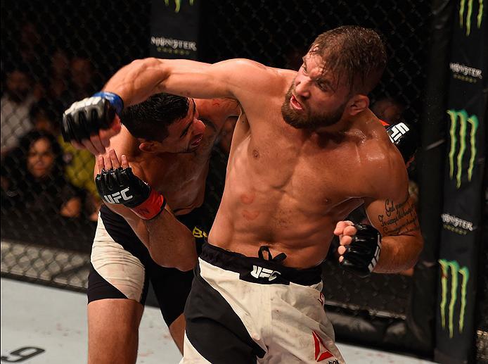 LAS VEGAS, NV - MAY 29: (R-L) Jeremy Stephens elbows Renan Barao of Brazil in their featherweight bout during the UFC Fight Night event inside the Mandalay Bay Events Center on May 29, 2016 in Las Vegas, Nevada.  (Photo by Josh Hedges/Zuffa LLC/Zuffa LLC 