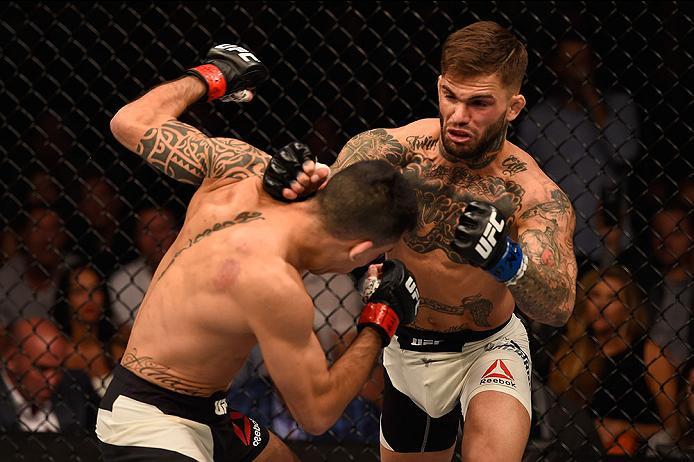 LAS VEGAS, NV - MAY 29: (R-L) Cody Garbrandt punches Thomas Almeida of Brazil in their bantamweight bout during the UFC Fight Night event inside the Mandalay Bay Events Center on May 29, 2016 in Las Vegas, Nevada. (Photo by Josh Hedges/Zuffa LLC/Zuffa LL