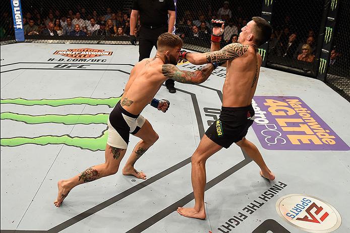 LAS VEGAS, NV - MAY 29: (L-R) Cody Garbrandt punches Thomas Almeida of Brazil in their bantamweight bout during the UFC Fight Night event inside the Mandalay Bay Events Center on May 29, 2016 in Las Vegas, Nevada.  (Photo by Josh Hedges/Zuffa LLC/Zuffa LL