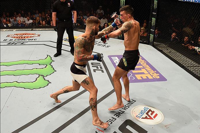 LAS VEGAS, NV - MAY 29: (L-R) Cody Garbrandt punches Thomas Almeida of Brazil in their bantamweight bout during the UFC Fight Night event inside the Mandalay Bay Events Center on May 29, 2016 in Las Vegas, Nevada. (Photo by Josh Hedges/Zuffa LLC/Zuffa L