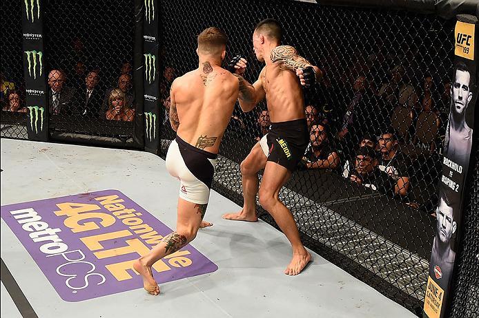 LAS VEGAS, NV - MAY 29: (L-R) Cody Garbrandt punches Thomas Almeida of Brazil in their bantamweight bout during the UFC Fight Night event inside the Mandalay Bay Events Center on May 29, 2016 in Las Vegas, Nevada.  (Photo by Josh Hedges/Zuffa LLC/Zuffa LL