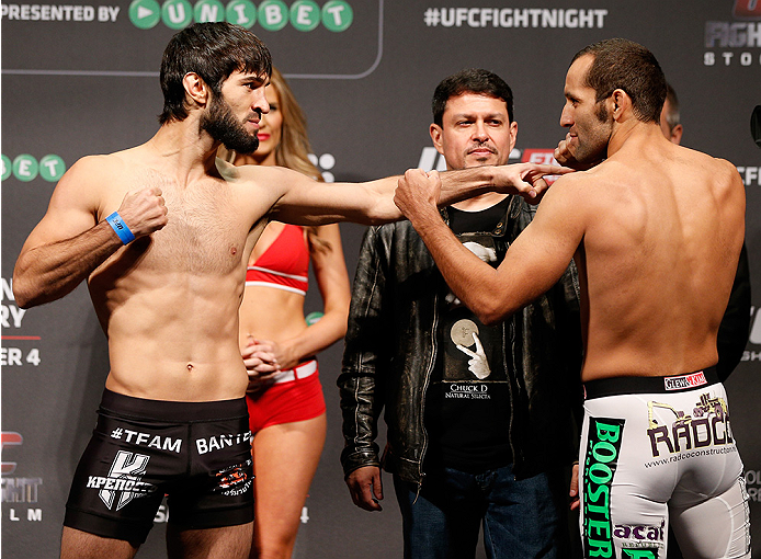 STOCKHOLM, SWEDEN - OCTOBER 03:  (L-R) Opponents Zubaira Tukhugov of Russia and Ernest Chavez face off during the UFC weigh-in at the Ericsson Globe Arena on October 3, 2014 in Stockholm, Sweden.  (Photo by Josh Hedges/Zuffa LLC/Zuffa LLC)