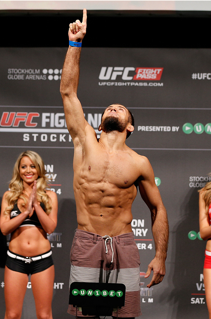 STOCKHOLM, SWEDEN - OCTOBER 03:  Mairbek Taisumov of Russia poses on the scale after weighing in during the UFC weigh-in at the Ericsson Globe Arena on October 3, 2014 in Stockholm, Sweden.  (Photo by Josh Hedges/Zuffa LLC/Zuffa LLC)