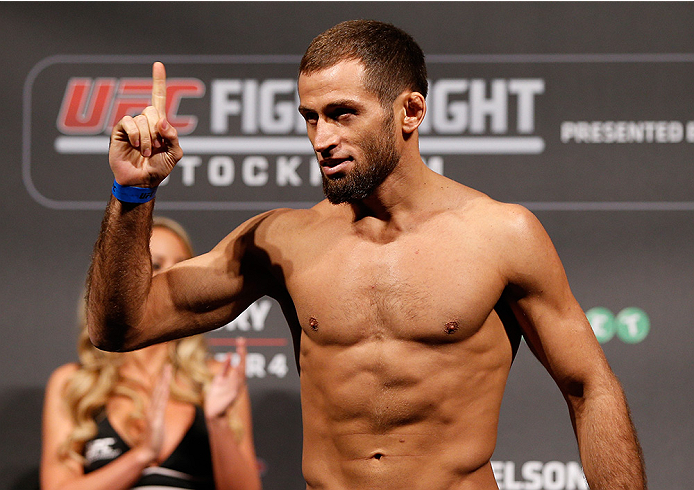 STOCKHOLM, SWEDEN - OCTOBER 03:  Mairbek Taisumov of Russia poses on the scale after weighing in during the UFC weigh-in at the Ericsson Globe Arena on October 3, 2014 in Stockholm, Sweden.  (Photo by Josh Hedges/Zuffa LLC/Zuffa LLC)