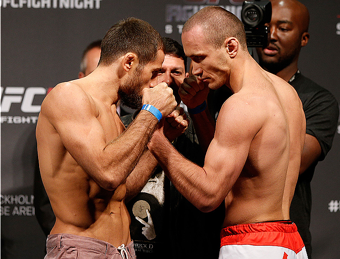 STOCKHOLM, SWEDEN - OCTOBER 03:  (L-R) Opponents Mairbek Taisumov of Russia and Marcin Bandel of Poland face off during the UFC weigh-in at the Ericsson Globe Arena on October 3, 2014 in Stockholm, Sweden.  (Photo by Josh Hedges/Zuffa LLC/Zuffa LLC)