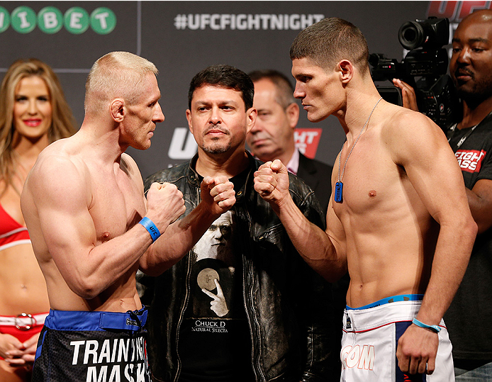 STOCKHOLM, SWEDEN - OCTOBER 03: (L-R) Opponents Dennis Siver of Germany and Charles Rosa face off during the UFC weigh-in at the Ericsson Globe Arena on October 3, 2014 in Stockholm, Sweden. (Photo by Josh Hedges/Zuffa LLC/Zuffa LLC)