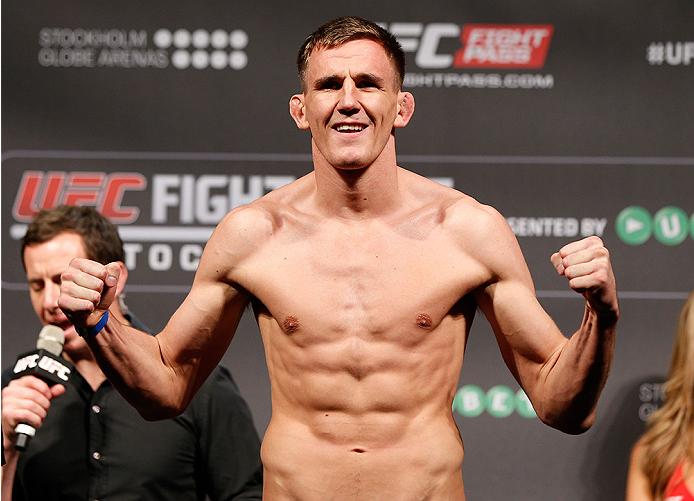 STOCKHOLM, SWEDEN - OCTOBER 03: Scott Askham of England poses on the scale after weighing in during the UFC weigh-in at the Ericsson Globe Arena on October 3, 2014 in Stockholm, Sweden. (Photo by Josh Hedges/Zuffa LLC/Zuffa LLC)
