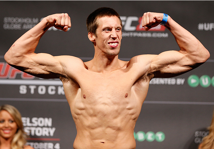 STOCKHOLM, SWEDEN - OCTOBER 03:  Magnus Cedenblad of Sweden poses on the scale after weighing in during the UFC weigh-in at the Ericsson Globe Arena on October 3, 2014 in Stockholm, Sweden.  (Photo by Josh Hedges/Zuffa LLC/Zuffa LLC)