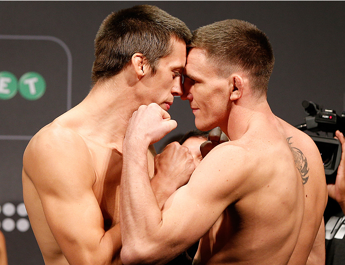 STOCKHOLM, SWEDEN - OCTOBER 03:  (L-R) Opponents Magnus Cedenblad of Sweden and Scott Askham of England face off during the UFC weigh-in at the Ericsson Globe Arena on October 3, 2014 in Stockholm, Sweden.  (Photo by Josh Hedges/Zuffa LLC/Zuffa LLC)