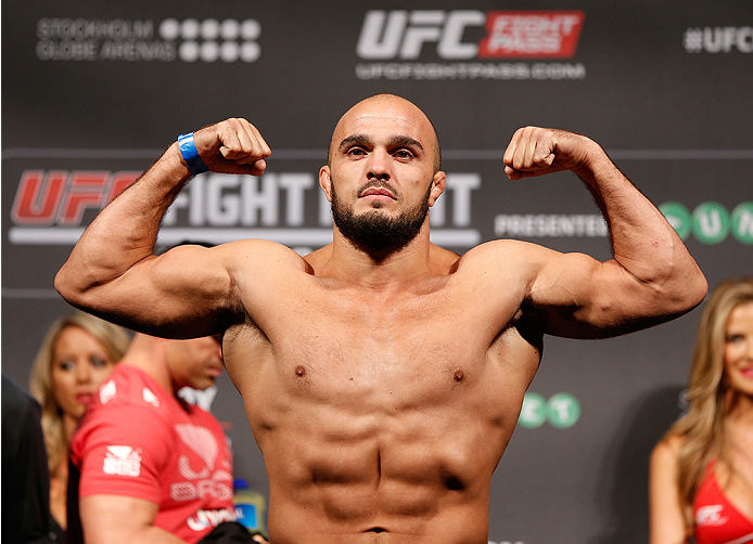 STOCKHOLM, SWEDEN - OCTOBER 03:  Ilir Latifi of Sweden poses on the scale after weighing in during the UFC weigh-in at the Ericsson Globe Arena on October 3, 2014 in Stockholm, Sweden.  (Photo by Josh Hedges/Zuffa LLC/Zuffa LLC)