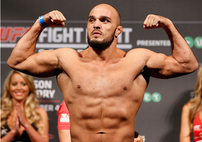 STOCKHOLM, SWEDEN - OCTOBER 03:  Ilir Latifi of Sweden poses on the scale after weighing in during the UFC weigh-in at the Ericsson Globe Arena on October 3, 2014 in Stockholm, Sweden.  (Photo by Josh Hedges/Zuffa LLC/Zuffa LLC)