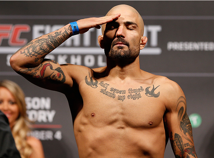 STOCKHOLM, SWEDEN - OCTOBER 03: Akira Corassani of Sweden poses on the scale after weighing in during the UFC weigh-in at the Ericsson Globe Arena on October 3, 2014 in Stockholm, Sweden. (Photo by Josh Hedges/Zuffa LLC/Zuffa LLC)