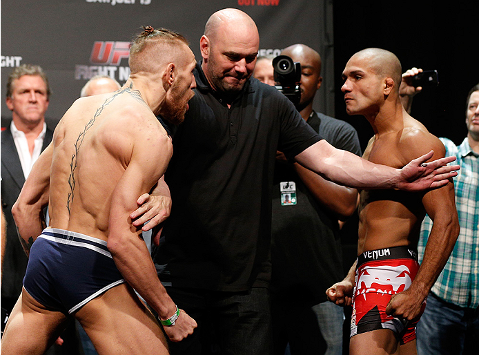 DUBLIN, IRELAND - JULY 18: Opponents Conor McGregor (L) and Diego Brandao (R) are separated by UFC President Dana White during the UFC weigh-in event at The O2 on July 18, 2014 in Dublin, Ireland. (Photo by Josh Hedges/Zuffa LLC/Zuffa LLC via Getty Imag