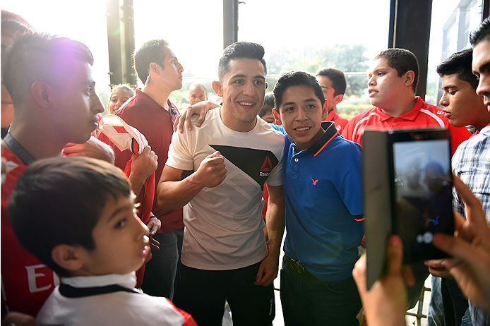 MONTERREY, MEXICO - NOVEMBER 18: Erik 'Goyito' Perez interacts with the crowd after holding an open workout for fans and media at Nave Lewis-Parque Fundidora on November 18, 2015 in Monterrey, Mexico. (Photo by Jeff Bottari/Zuffa LLC/Zuffa LLC via Getty
