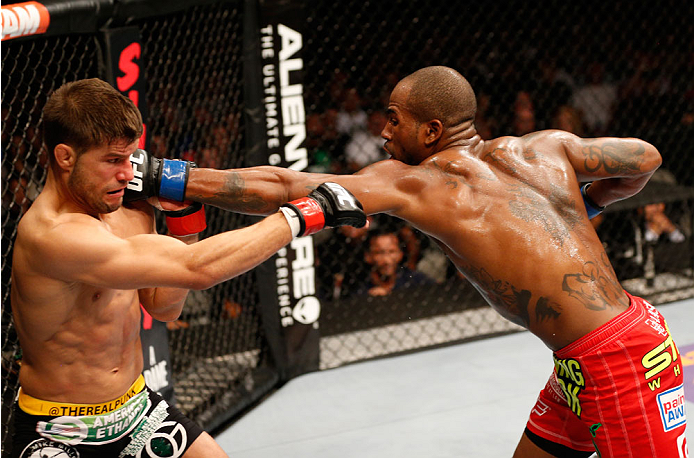 SAN JOSE, CA - JULY 26:  (R-L) Bobby Green punches Josh Thomson in their lightweight bout during the UFC Fight Night event at SAP Center on July 26, 2014 in San Jose, California.  (Photo by Josh Hedges/Zuffa LLC/Zuffa LLC via Getty Images)