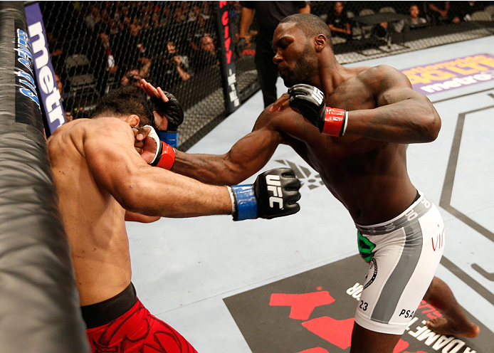 SAN JOSE, CA - JULY 26: (R-L) Anthony Johnson knocks out Antonio Rogerio Nogueira with a series of uppercuts in their light heavyweight bout during the UFC Fight Night event at SAP Center on July 26, 2014 in San Jose, California. (Photo by Josh Hedges/Z