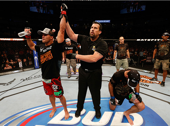 SAN JOSE, CA - JULY 26:  Robbie Lawler (L) celebrates after his unanimous-decision victory over Matt Brown in their welterweight bout during the UFC Fight Night event at SAP Center on July 26, 2014 in San Jose, California.  (Photo by Josh Hedges/Zuffa LLC