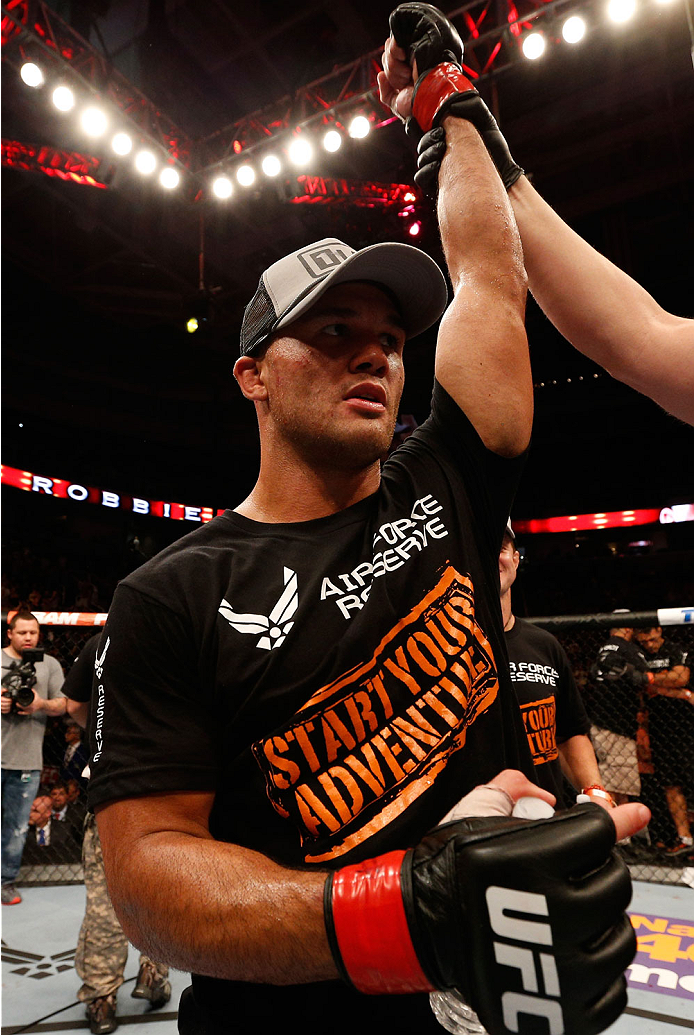 SAN JOSE, CA - JULY 26:  Robbie Lawler celebrates after his unanimous-decision victory over Matt Brown in their welterweight bout during the UFC Fight Night event at SAP Center on July 26, 2014 in San Jose, California.  (Photo by Josh Hedges/Zuffa LLC/Zuf