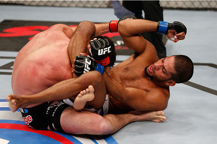 SAN JOSE, CA - JULY 26: (R-L) Noad Lahat controls the body of Steven Siler in their featherweight bout during the UFC Fight Night event at SAP Center on July 26, 2014 in San Jose, California. (Photo by Josh Hedges/Zuffa LLC/Zuffa LLC via Getty Images)