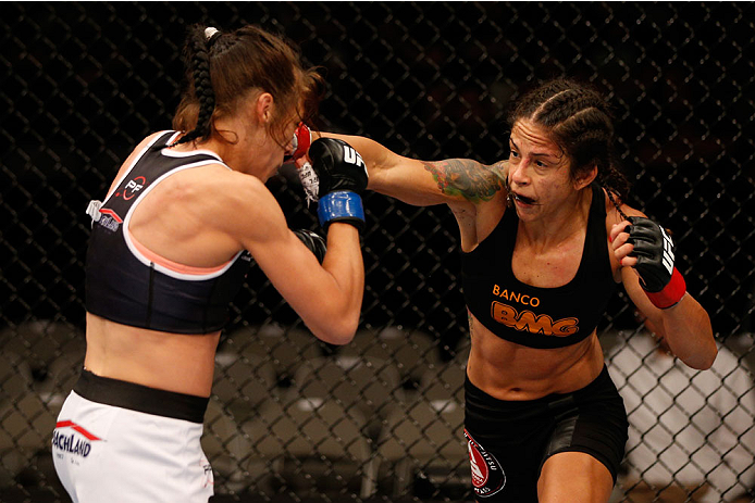 SAN JOSE, CA - JULY 26:  (R-L) Julianna Lima punches Joanna Jedrzejczyk in their womens strawweight bout during the UFC Fight Night event at SAP Center on July 26, 2014 in San Jose, California.  (Photo by Josh Hedges/Zuffa LLC/Zuffa LLC via Getty Images)