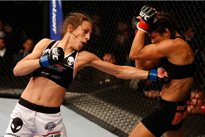 SAN JOSE, CA - JULY 26:  (L-R) Joanna Jedrzejczyk punches Julianna Lima in their womens strawweight bout during the UFC Fight Night event at SAP Center on July 26, 2014 in San Jose, California.  (Photo by Josh Hedges/Zuffa LLC/Zuffa LLC via Getty Images)