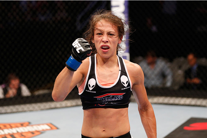 SAN JOSE, CA - JULY 26: Joanna Jedrzejczyk celebrates after defeating Julianna Lima in their womens strawweight bout during the UFC Fight Night event at SAP Center on July 26, 2014 in San Jose, California. (Photo by Josh Hedges/Zuffa LLC/Zuffa LLC via G