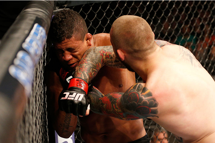SAN JOSE, CA - JULY 26: (R-L) Andreas Stahl elbows Gilbert Burns in their welterweight bout during the UFC Fight Night event at SAP Center on July 26, 2014 in San Jose, California. (Photo by Josh Hedges/Zuffa LLC/Zuffa LLC via Getty Images)