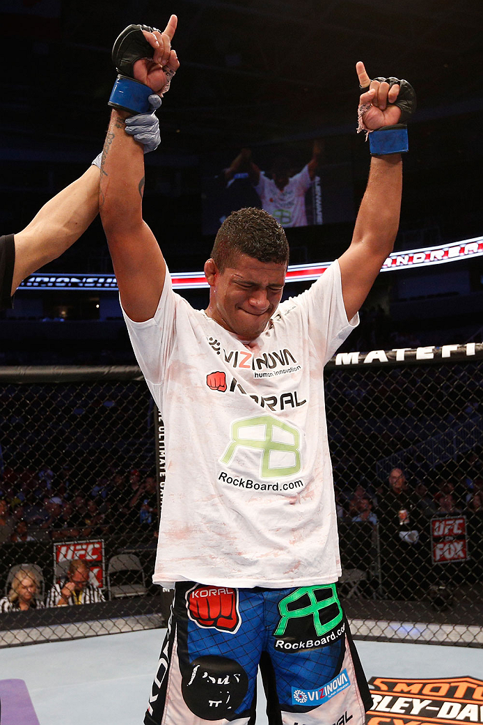 SAN JOSE, CA - JULY 26:  Gilbert Burns celebrates after defeating Andreas Stahl in their welterweight bout during the UFC Fight Night event at SAP Center on July 26, 2014 in San Jose, California.  (Photo by Josh Hedges/Zuffa LLC/Zuffa LLC via Getty Images