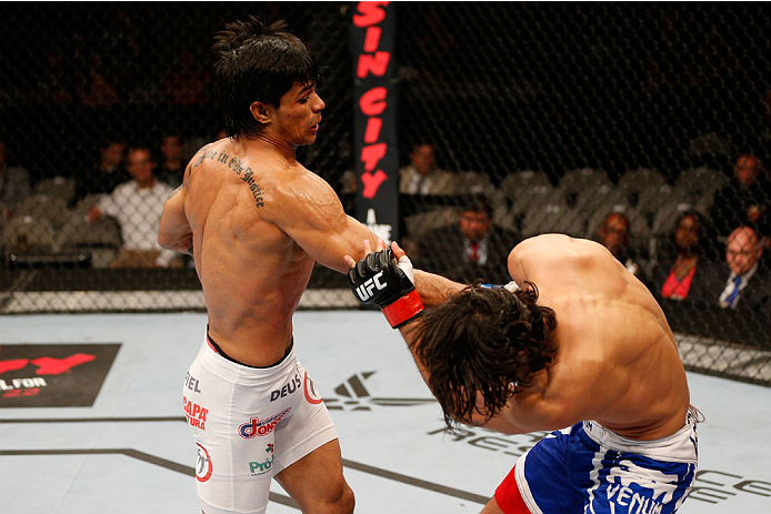 SAN JOSE, CA - JULY 26:  (L-R) Tiago Trator punches Akbarh Arreola in their lightweight bout during the UFC Fight Night event at SAP Center on July 26, 2014 in San Jose, California.  (Photo by Josh Hedges/Zuffa LLC/Zuffa LLC via Getty Images)