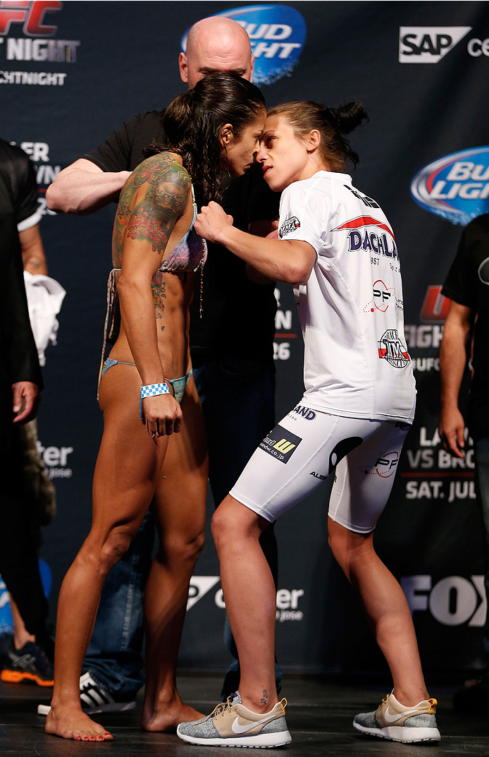 SAN JOSE, CA - JULY 25: (L-R) Opponents Juliana Lima and Joanna Jedrzejczyk face off during the UFC fight night weigh-in at the SAP Center on July 25, 2014 in San Jose, California. (Photo by Josh Hedges/Zuffa LLC/Zuffa LLC via Getty Images)