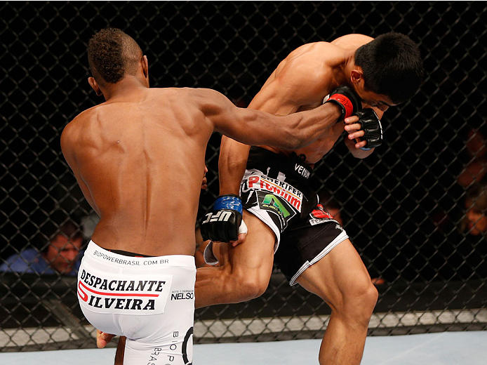 SAO PAULO, BRAZIL - MAY 31: (L-R) Kevin Souza counters a Mark Eddiva kick with a punch in their featherweight fight during the UFC Fight Night event at the Ginasio do Ibirapuera on May 31, 2014 in Sao Paulo, Brazil. (Photo by Josh Hedges/Zuffa LLC/Zuffa L