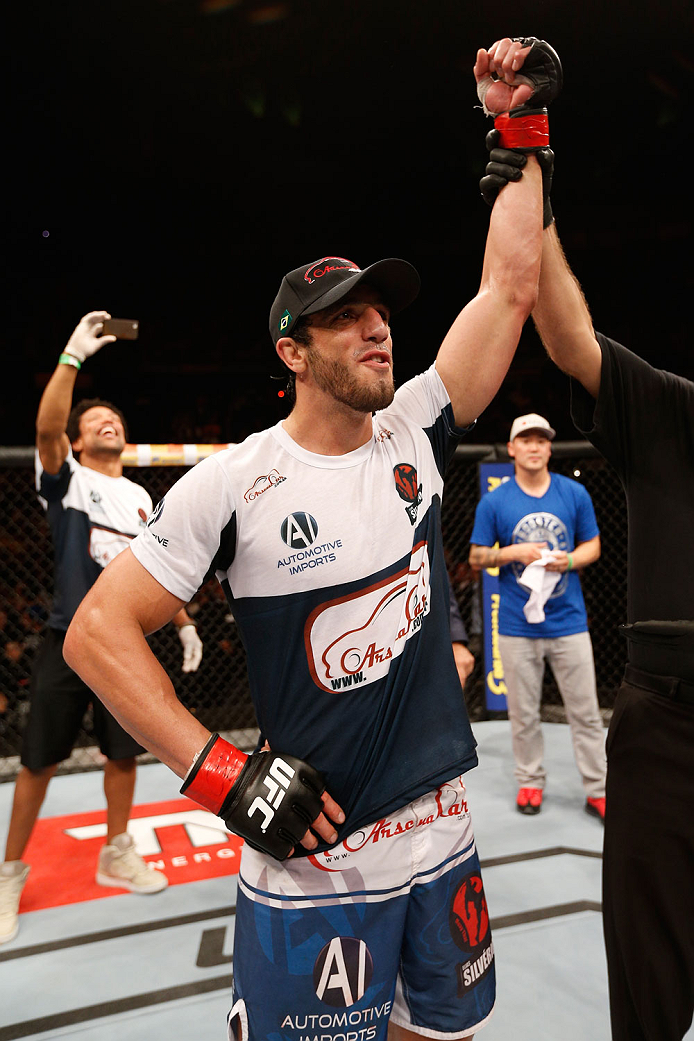 SAO PAULO, BRAZIL - MAY 31: Elias Silverio reacts after his submission victory over Ernest Chavez in their lightweight fight during the UFC Fight Night event at the Ginasio do Ibirapuera on May 31, 2014 in Sao Paulo, Brazil. (Photo by Josh Hedges/Zuffa L