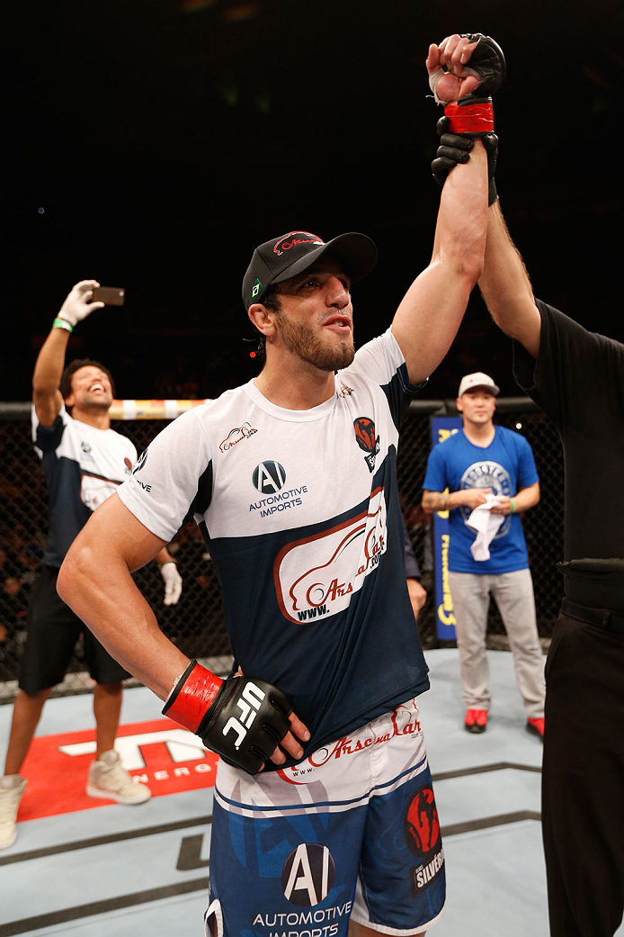 SAO PAULO, BRAZIL - MAY 31:  Elias Silverio reacts after his submission victory over Ernest Chavez in their lightweight fight during the UFC Fight Night event at the Ginasio do Ibirapuera on May 31, 2014 in Sao Paulo, Brazil. (Photo by Josh Hedges/Zuffa L