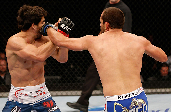 SAO PAULO, BRAZIL - MAY 31: (R-L) Ernest Chavez punches Elias Silverio in their lightweight fight during the UFC Fight Night event at the Ginasio do Ibirapuera on May 31, 2014 in Sao Paulo, Brazil. (Photo by Josh Hedges/Zuffa LLC/Zuffa LLC via Getty Image