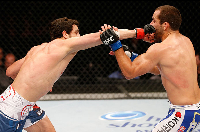 SAO PAULO, BRAZIL - MAY 31: (L-R) Elias Silverio punches Ernest Chavez in their lightweight fight during the UFC Fight Night event at the Ginasio do Ibirapuera on May 31, 2014 in Sao Paulo, Brazil. (Photo by Josh Hedges/Zuffa LLC/Zuffa LLC via Getty Image