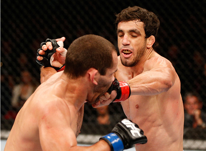 SAO PAULO, BRAZIL - MAY 31: (R-L) Elias Silverio punches Ernest Chavez in their lightweight fight during the UFC Fight Night event at the Ginasio do Ibirapuera on May 31, 2014 in Sao Paulo, Brazil. (Photo by Josh Hedges/Zuffa LLC/Zuffa LLC via Getty Image