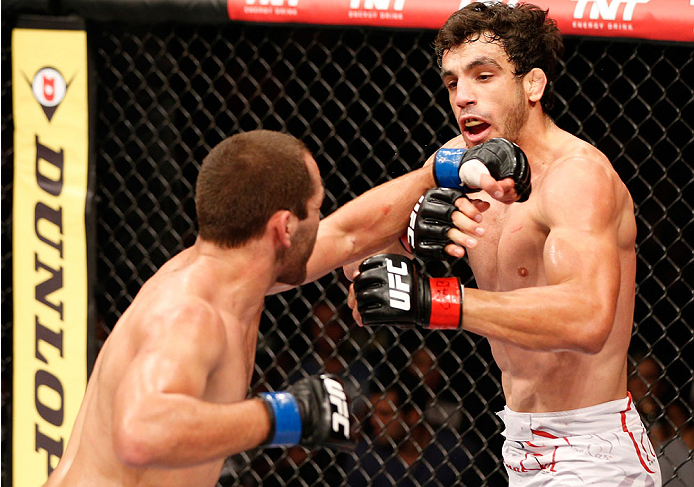 SAO PAULO, BRAZIL - MAY 31: (L-R) Ernest Chavez punches Elias Silverio in their lightweight fight during the UFC Fight Night event at the Ginasio do Ibirapuera on May 31, 2014 in Sao Paulo, Brazil. (Photo by Josh Hedges/Zuffa LLC/Zuffa LLC via Getty Image