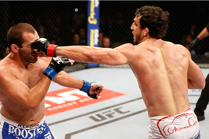 SAO PAULO, BRAZIL - MAY 31: (R-L) Elias Silverio punches Ernest Chavez in their lightweight fight during the UFC Fight Night event at the Ginasio do Ibirapuera on May 31, 2014 in Sao Paulo, Brazil. (Photo by Josh Hedges/Zuffa LLC/Zuffa LLC via Getty Image