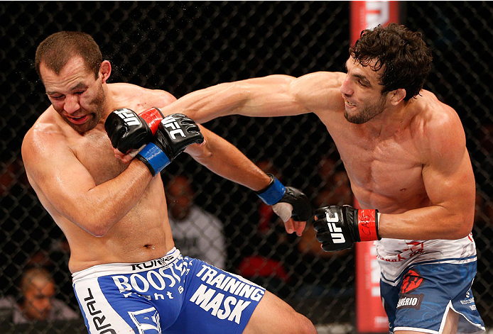 SAO PAULO, BRAZIL - MAY 31: (R-L) Elias Silverio punches Ernest Chavez in their lightweight fight during the UFC Fight Night event at the Ginasio do Ibirapuera on May 31, 2014 in Sao Paulo, Brazil. (Photo by Josh Hedges/Zuffa LLC/Zuffa LLC via Getty Image