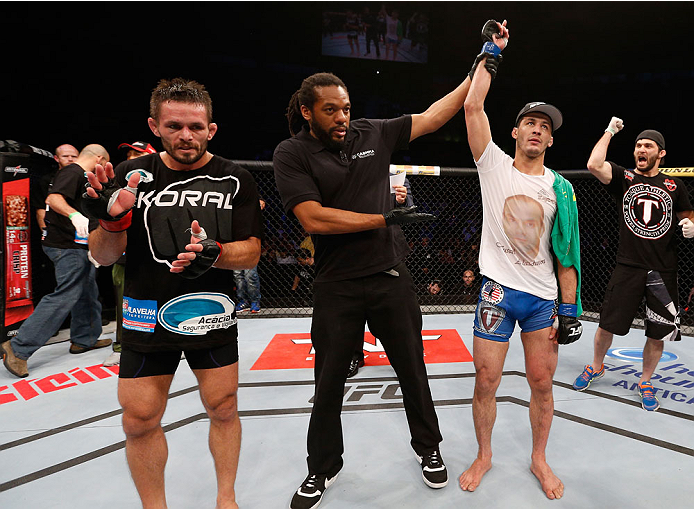 SAO PAULO, BRAZIL - MAY 31: Rashid Magomedov reacts after his decision victory over Rodrigo Damm in their lightweight fight during the UFC Fight Night event at the Ginasio do Ibirapuera on May 31, 2014 in Sao Paulo, Brazil. (Photo by Josh Hedges/Zuffa LLC