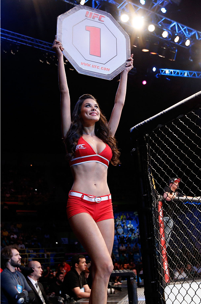 SAO PAULO, BRAZIL - MAY 31: UFC Octagon Girl Camila Rodrigues de Oliveira introduces a round during the UFC Fight Night event at the Ginasio do Ibirapuera on May 31, 2014 in Sao Paulo, Brazil. (Photo by Josh Hedges/Zuffa LLC/Zuffa LLC via Getty Images)