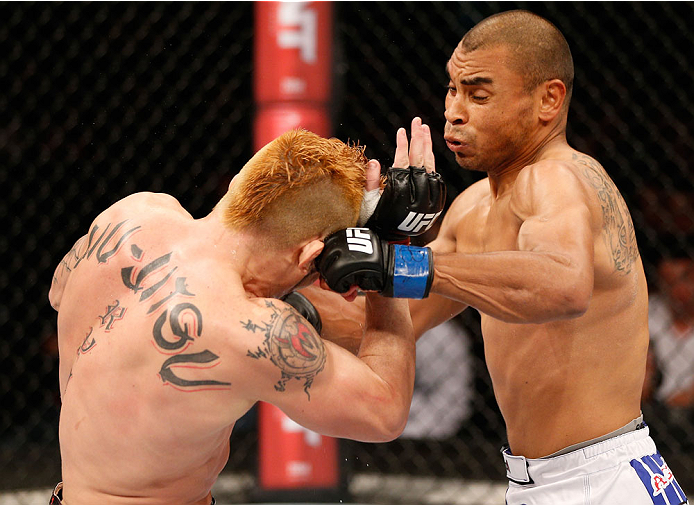 SAO PAULO, BRAZIL - MAY 31: (R-L) Robbie Peralta punches Rony "Jason" Mariano-Bazzera in their featherweight fight during the UFC Fight Night event at the Ginasio do Ibirapuera on May 31, 2014 in Sao Paulo, Brazil. (Photo by Josh Hedges/Zuffa LLC/Zuffa LL