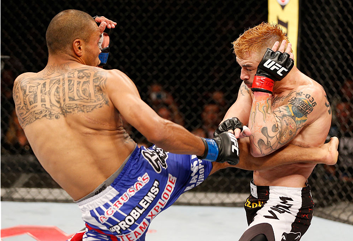 SAO PAULO, BRAZIL - MAY 31: (L-R) Robbie Peralta kicks Rony "Jason" Mariano-Bazzera in their featherweight fight during the UFC Fight Night event at the Ginasio do Ibirapuera on May 31, 2014 in Sao Paulo, Brazil. (Photo by Josh Hedges/Zuffa LLC/Zuffa LLC