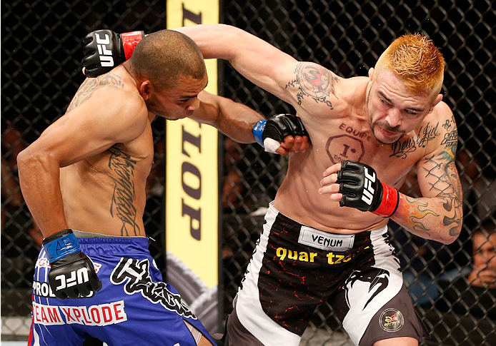 SAO PAULO, BRAZIL - MAY 31: (R-L) Rony "Jason" Mariano-Bazzera punches Robbie Peralta in their featherweight fight during the UFC Fight Night event at the Ginasio do Ibirapuera on May 31, 2014 in Sao Paulo, Brazil. (Photo by Josh Hedges/Zuffa LLC/Zuffa LL