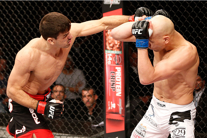 SAO PAULO, BRAZIL - MAY 31: (L-R) Demian Maia punches Alexander Yakovlev in their welterweight fight during the UFC Fight Night event at the Ginasio do Ibirapuera on May 31, 2014 in Sao Paulo, Brazil. (Photo by Josh Hedges/Zuffa LLC/Zuffa LLC via Getty Im