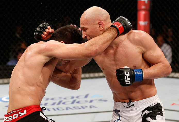 SAO PAULO, BRAZIL - MAY 31: (R-L) Alexander Yakovlev punches Demian Maia in their welterweight fight during the UFC Fight Night event at the Ginasio do Ibirapuera on May 31, 2014 in Sao Paulo, Brazil. (Photo by Josh Hedges/Zuffa LLC/Zuffa LLC via Getty Im