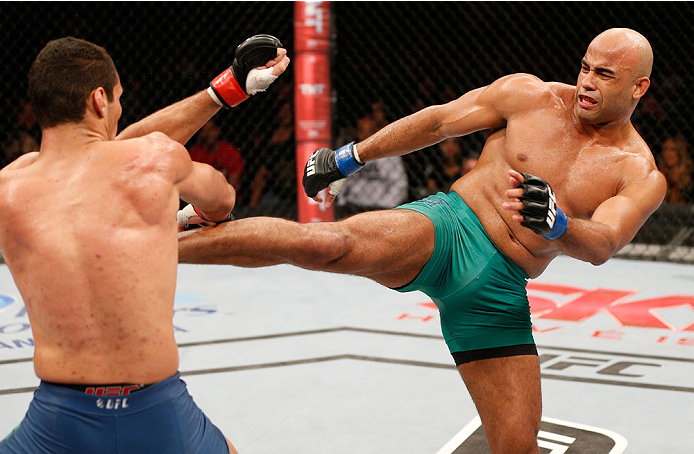 SAO PAULO, BRAZIL - MAY 31:  (R-L) Warlley Alves kicks Marcio Alexandre in their middleweight fight during the UFC Fight Night event at the Ginasio do Ibirapuera on May 31, 2014 in Sao Paulo, Brazil. (Photo by Josh Hedges/Zuffa LLC/Zuffa LLC via Getty Ima